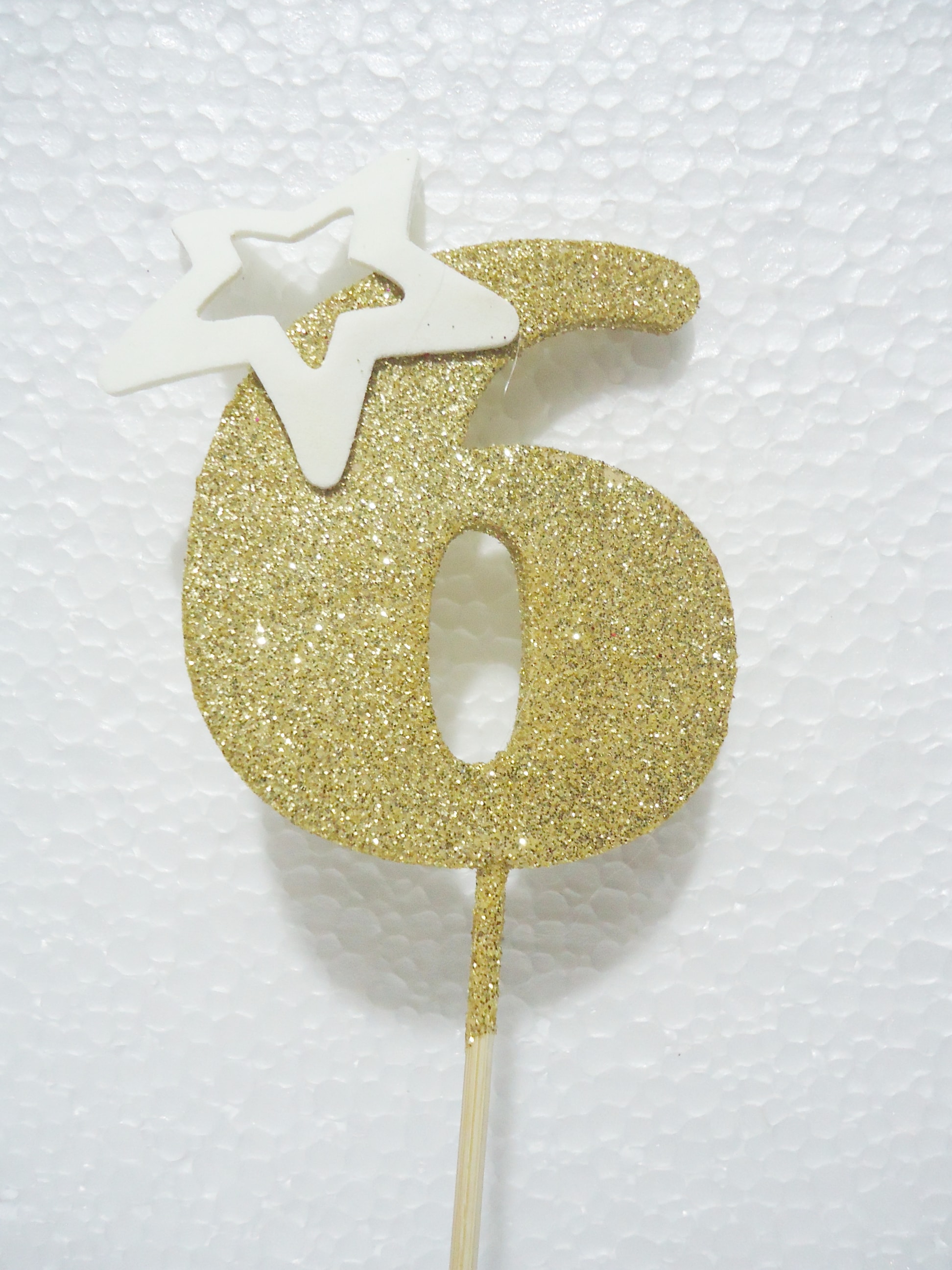 NUMERO PINCHE 6 DORADO METAL