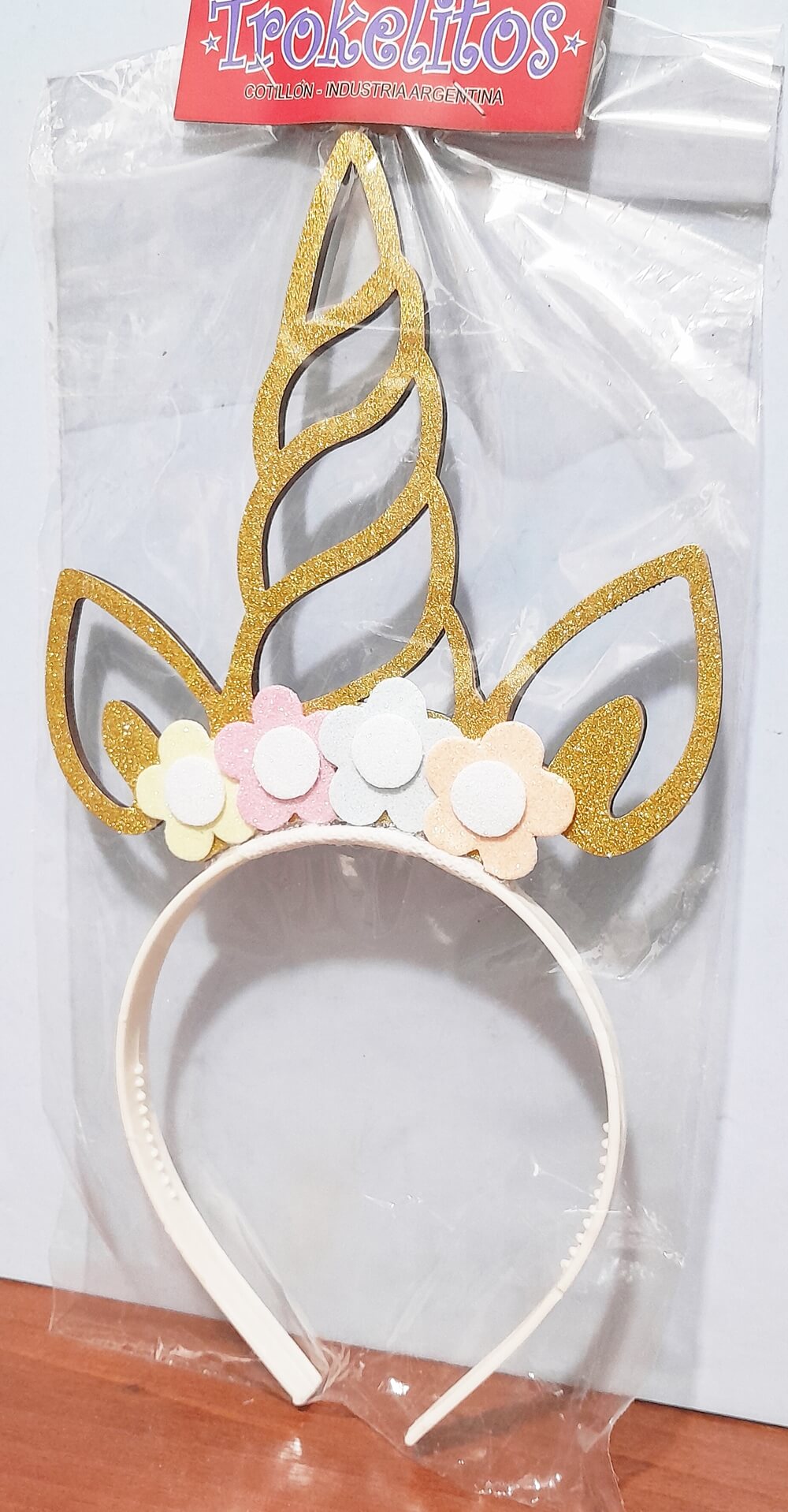 VINCHA UNICORNIO CON FLORES TROKELITOS